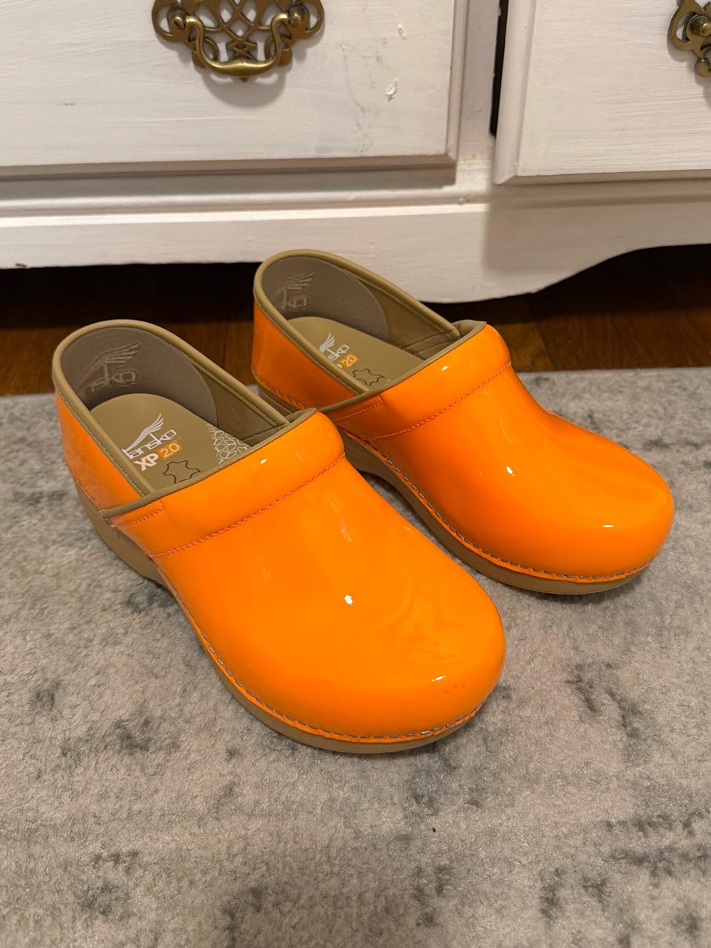 Dansko XP 2.0 Neon Orange Patent Clogs